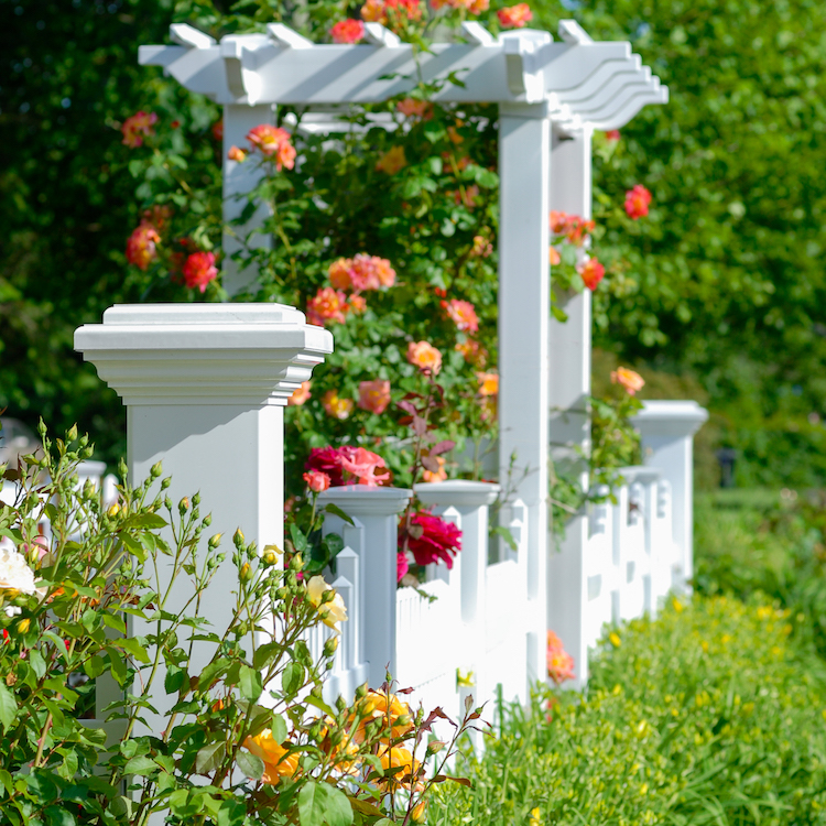 This Beautiful American Dream White Picket Fence Style V706-4 by Illusions Vinyl Fence is a Perfect Example of How Your Fence Can Add Curb Appeal to Your Home. #fenceideas #curbappeal #americandream